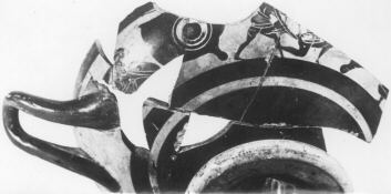 CUP, STEMLESS (ATHENIAN, BLACK-FIGURE)