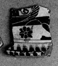 PYXIS LID, FRAGMENT (EAST GREEK, NAUCRATITE, BLACK-FIGURE)